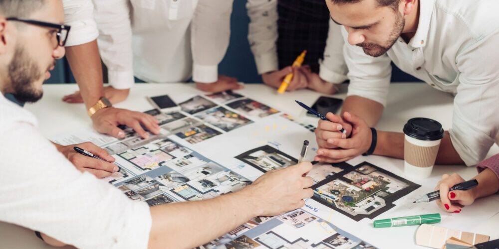 Modern Methods of Construction, MMC. People looking at plans.